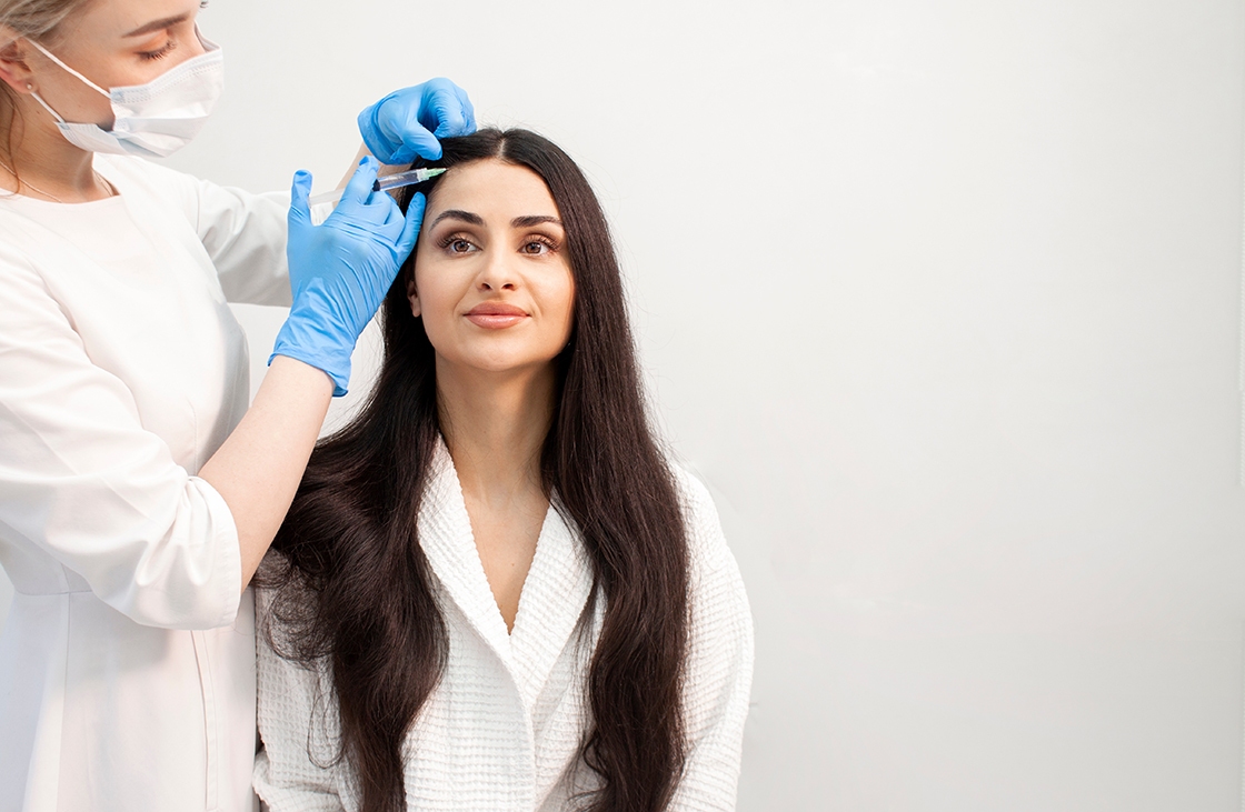 Beautiful woman getting exosomes therapy Beautiful woman getting exosomes therapy